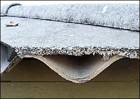 Grimston Garage Asbestos roof removal Huddersfield